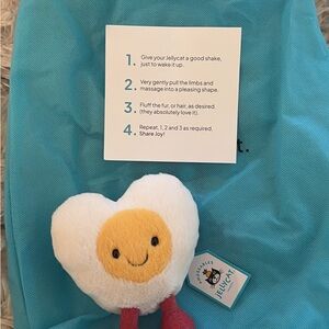 Jellycat White Heart Egg Plush with Yellow Face and Pink Glitter Legs